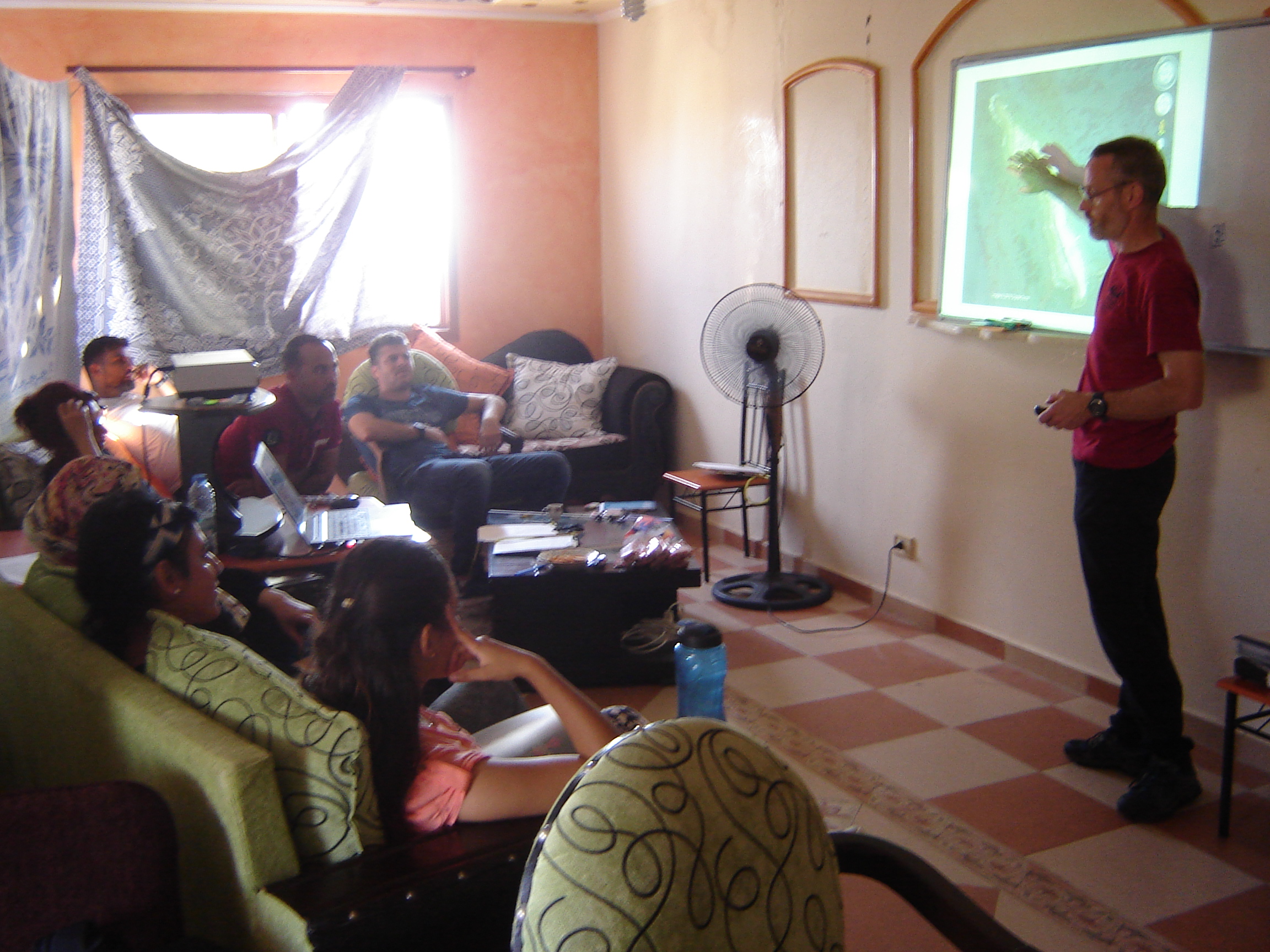 Dave lecturing in the apartment's classroom